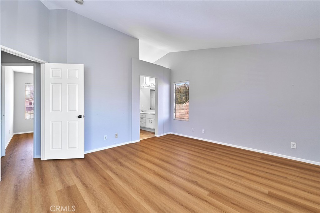 5280 Melbourne Place Riverside, CA 92508 - Photo 35 of 59 a view of an empty room with wooden floor