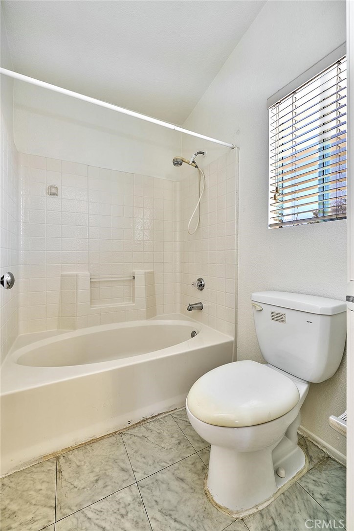 5280 Melbourne Place Riverside, CA 92508 - Photo 39 of 59 a bathroom with a toilet and a bath tub