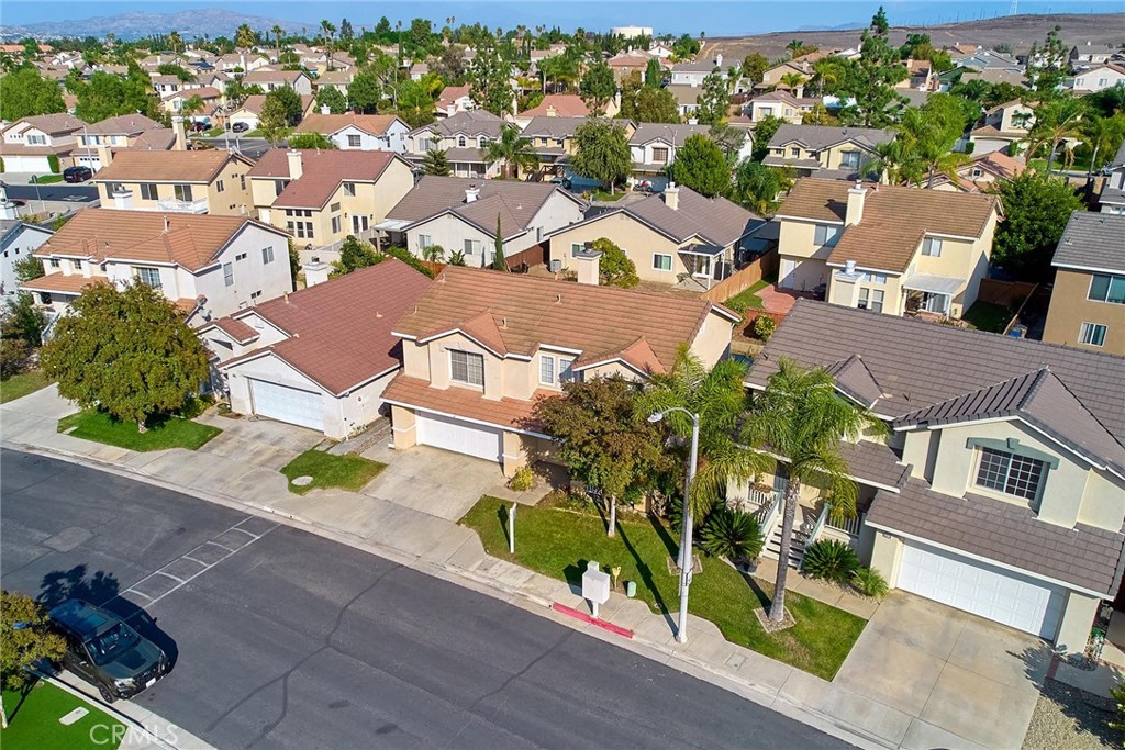 5280 Melbourne Place Riverside, CA 92508 - Photo 4 of 59 an aerial view of residential houses with outdoor space