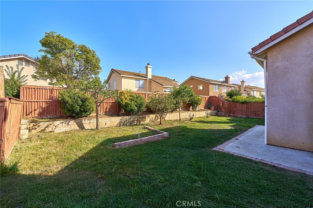 5280 Melbourne Place Riverside, CA 92508 - Photo 46 of 59 a view of a big yard with a house