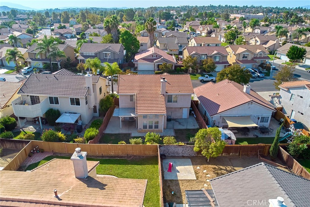 5280 Melbourne Place Riverside, CA 92508 - Photo 6 of 59 an aerial view of multiple houses with a yard