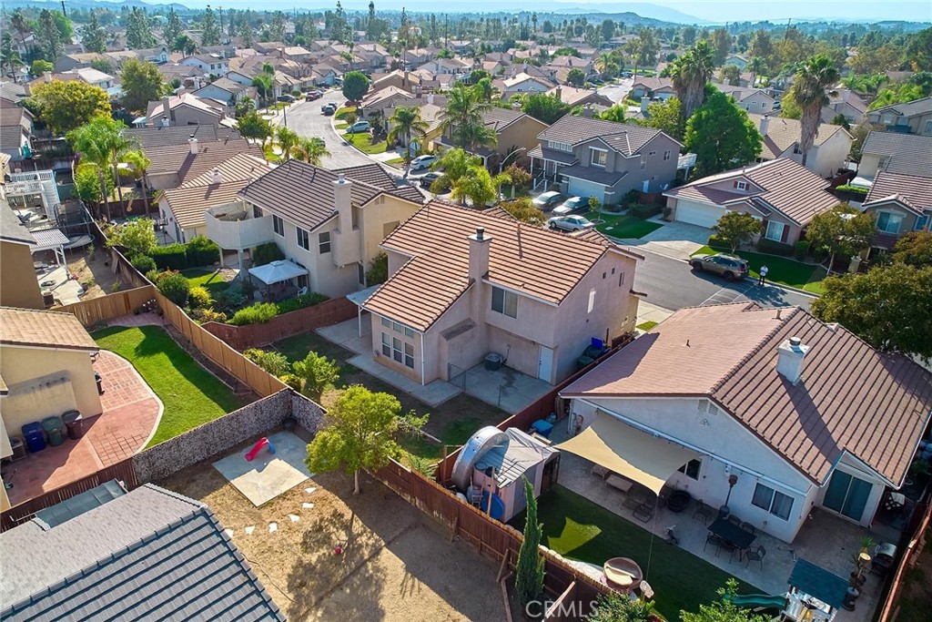 5280 Melbourne Place Riverside, CA 92508 - Photo 7 of 59 an aerial view of a house with a garden