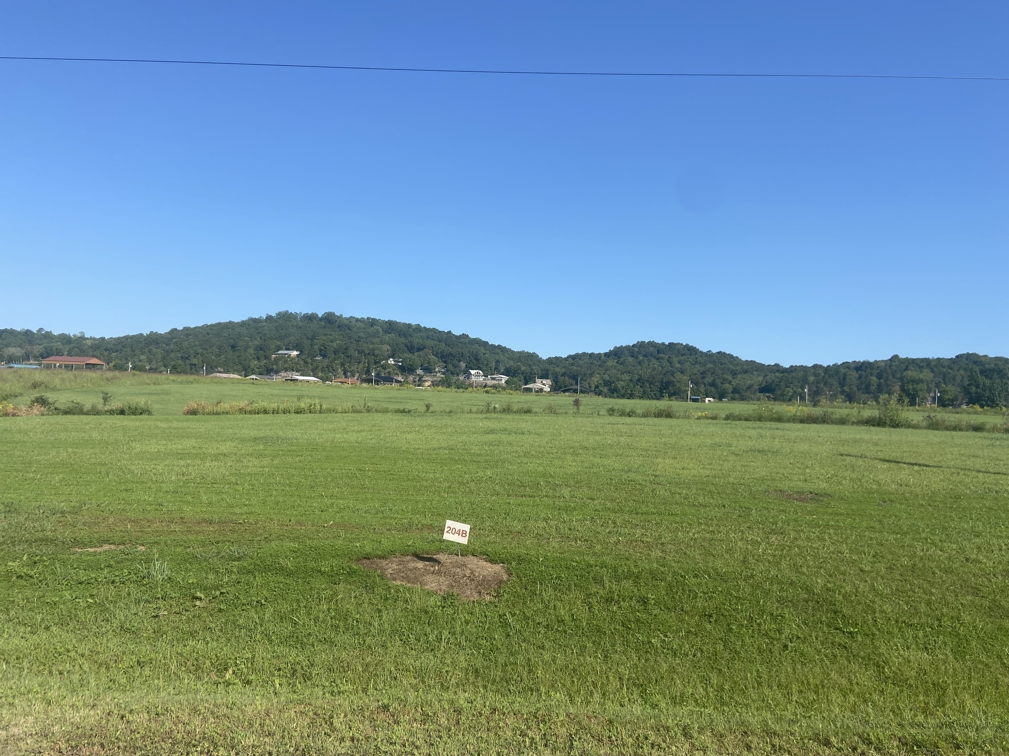 390 Duck Blind Road Clifton, TN 38425 - Photo 10 of 14 a view of a lake and a mountain