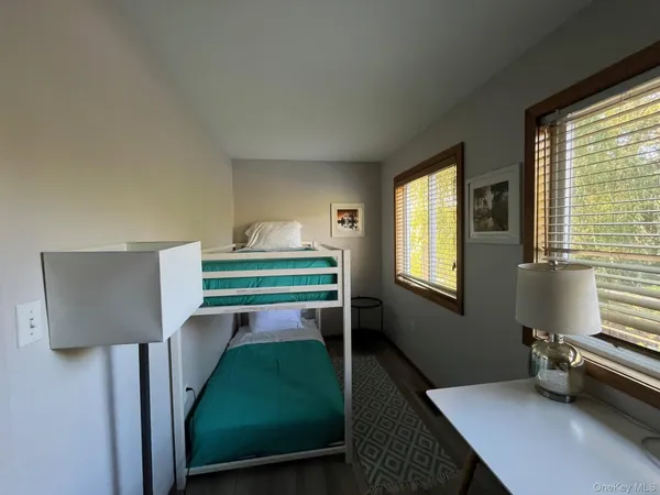 a room with furniture and a window