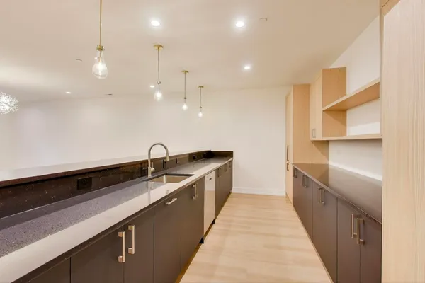 a picture of a bathroom with a shower