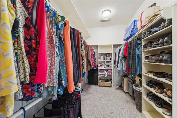 a view of a walk in closet