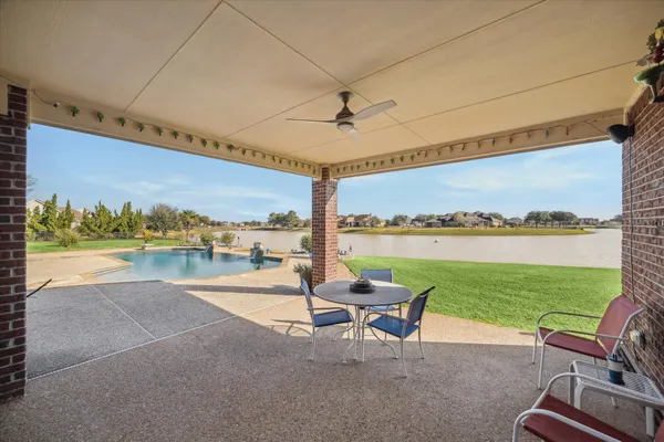 a balcony with furniture and city view