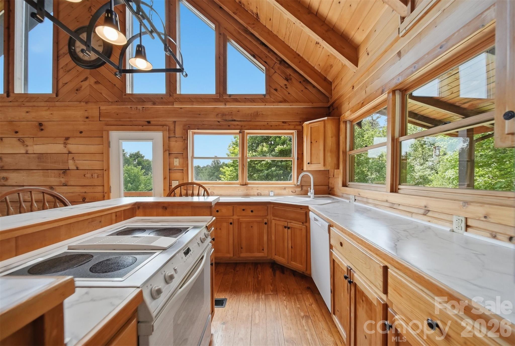 2079 Icard Ridge Road Taylorsville, NC 28681 - Photo 15 of 48 a kitchen with a sink and large window
