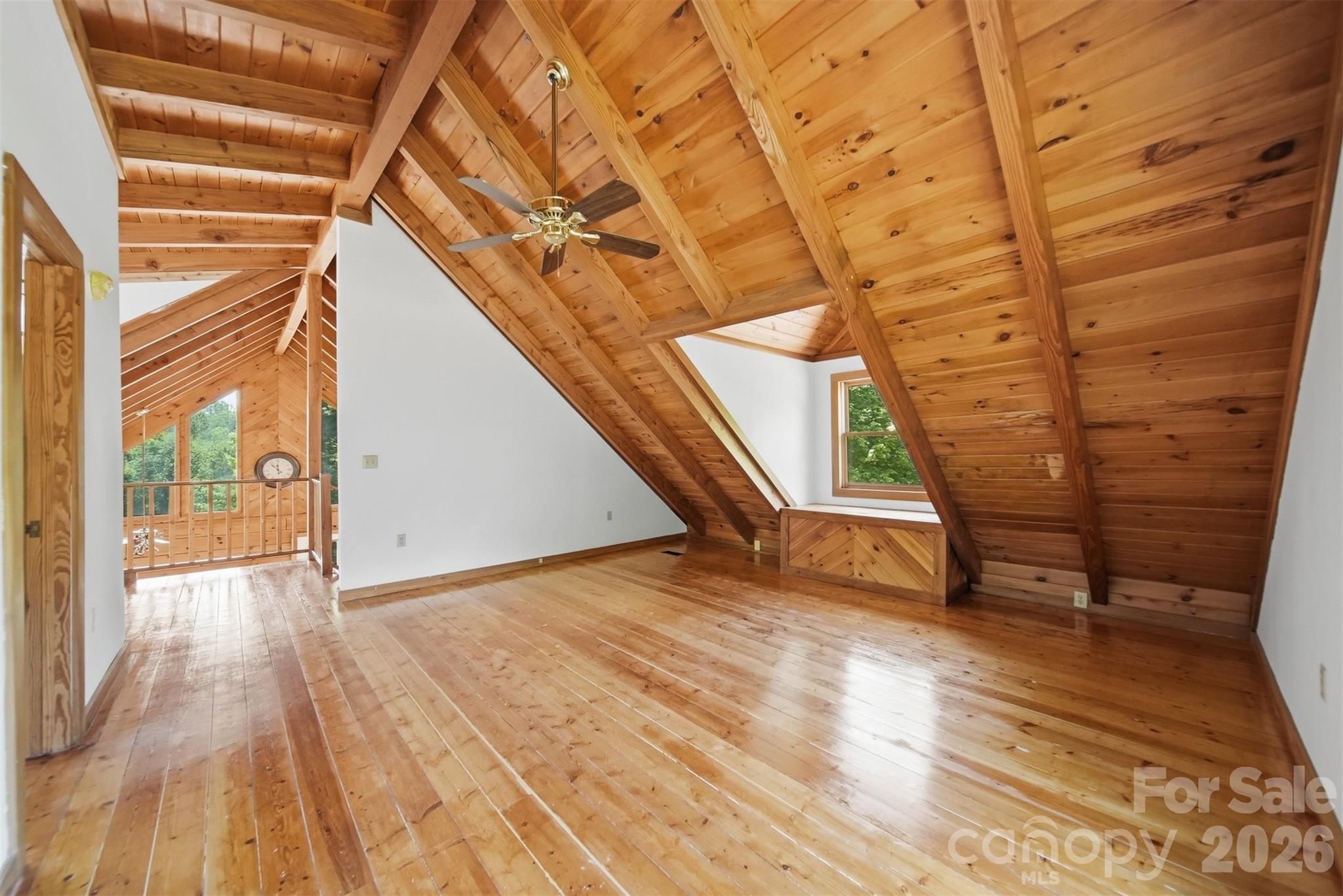 2079 Icard Ridge Road Taylorsville, NC 28681 - Photo 36 of 48 a view of an empty room with wooden floor and a window