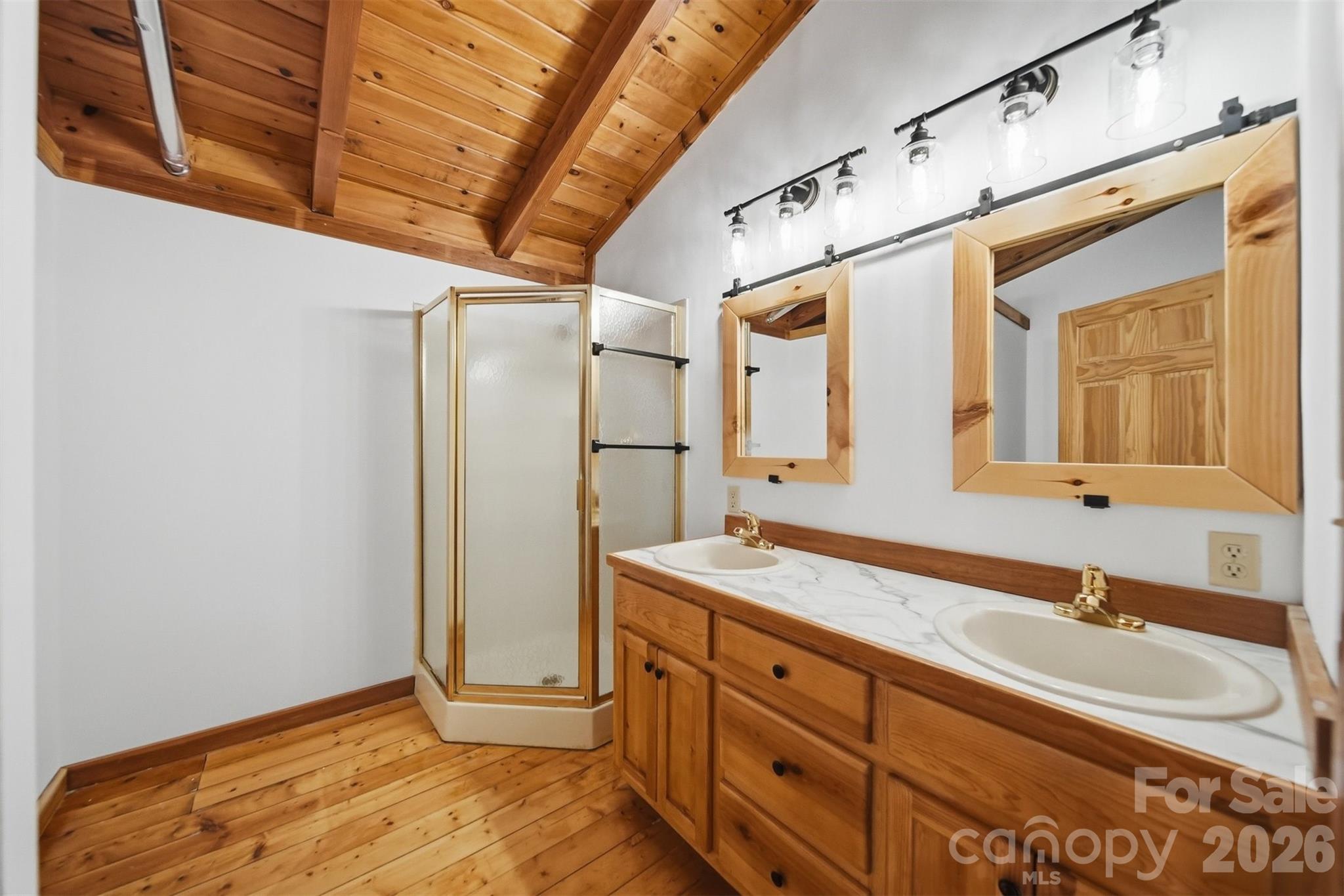2079 Icard Ridge Road Taylorsville, NC 28681 - Photo 37 of 48 a bathroom with a sink and a mirror
