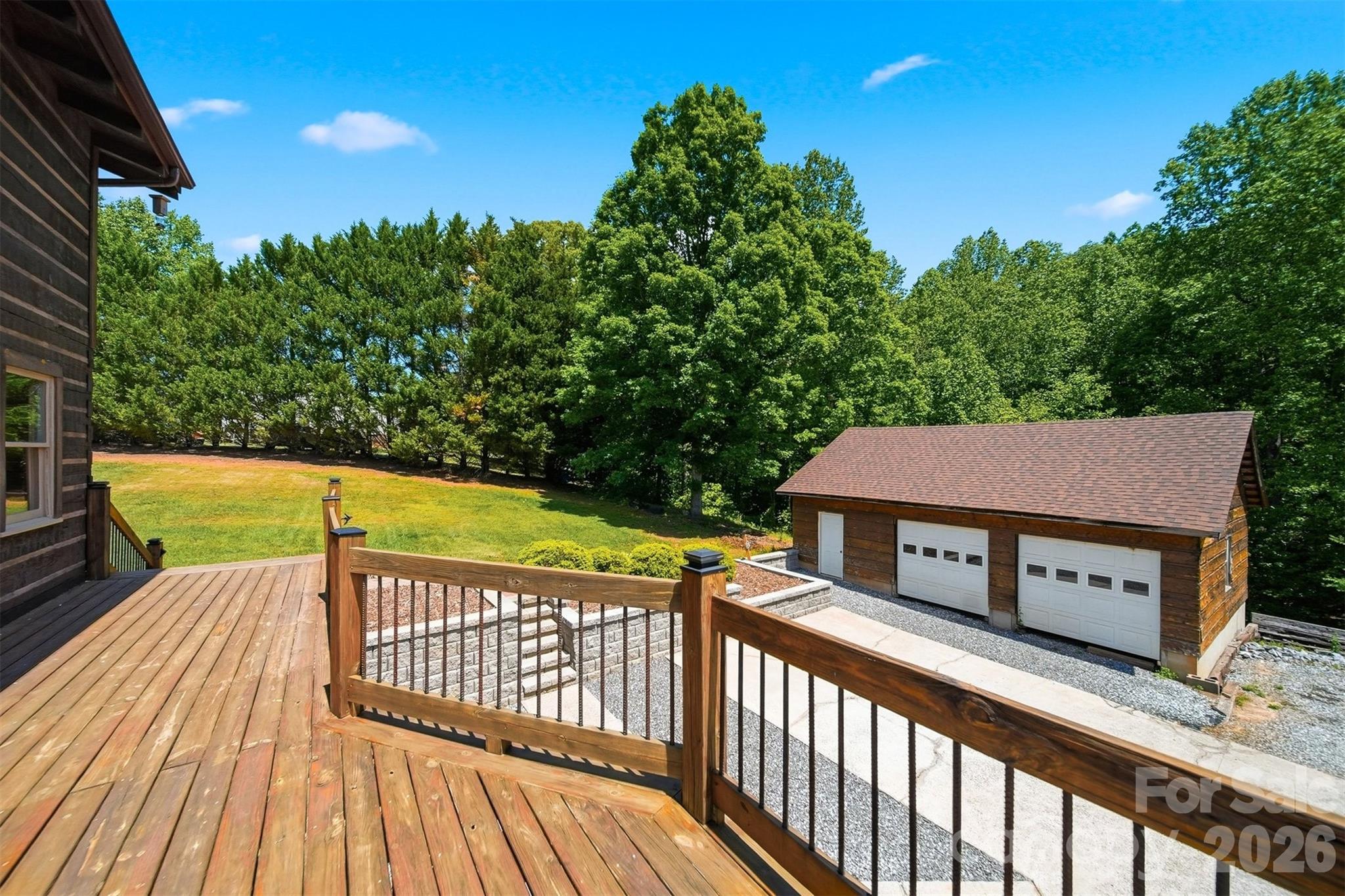 2079 Icard Ridge Road Taylorsville, NC 28681 - Photo 39 of 48 a view of a wooden deck with a yard