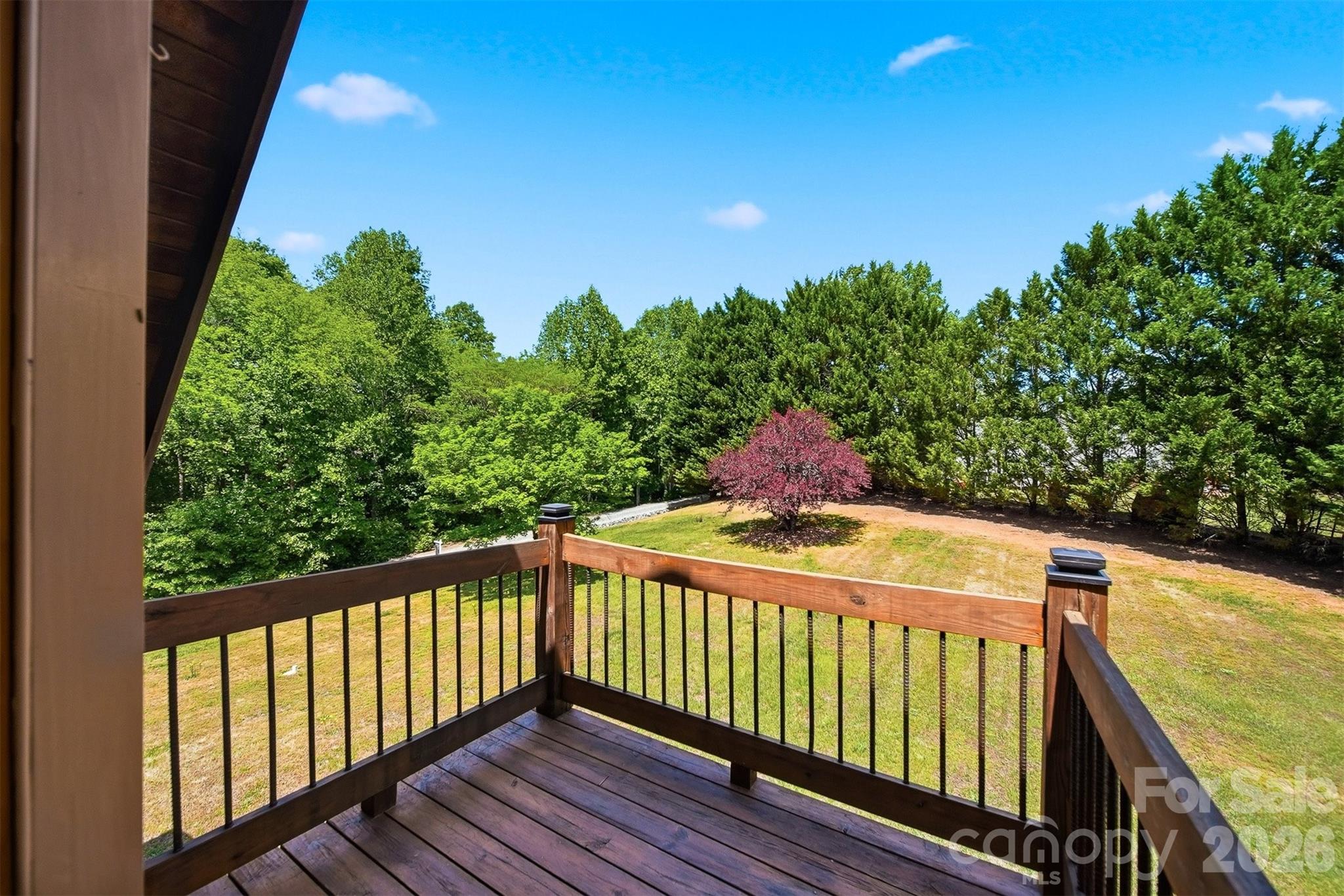 2079 Icard Ridge Road Taylorsville, NC 28681 - Photo 40 of 48 a view of a balcony with wooden fence