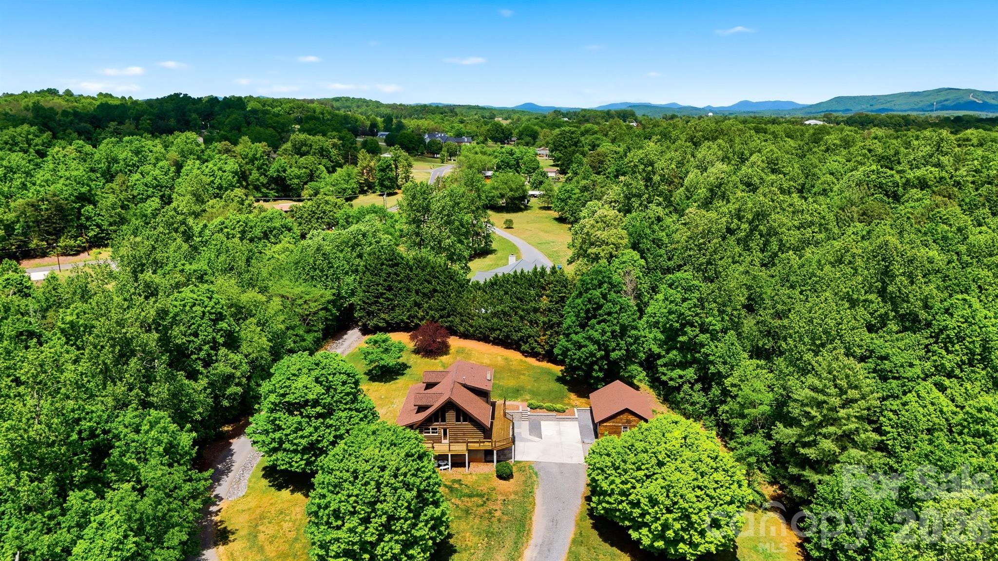 2079 Icard Ridge Road Taylorsville, NC 28681 - Photo 48 of 48 an aerial view of a house with a yard