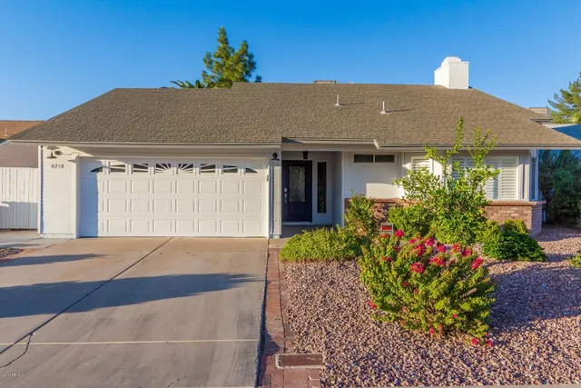 a front view of house with yard