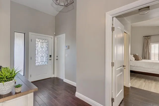 a view of livingroom with hardwood floor and hallway