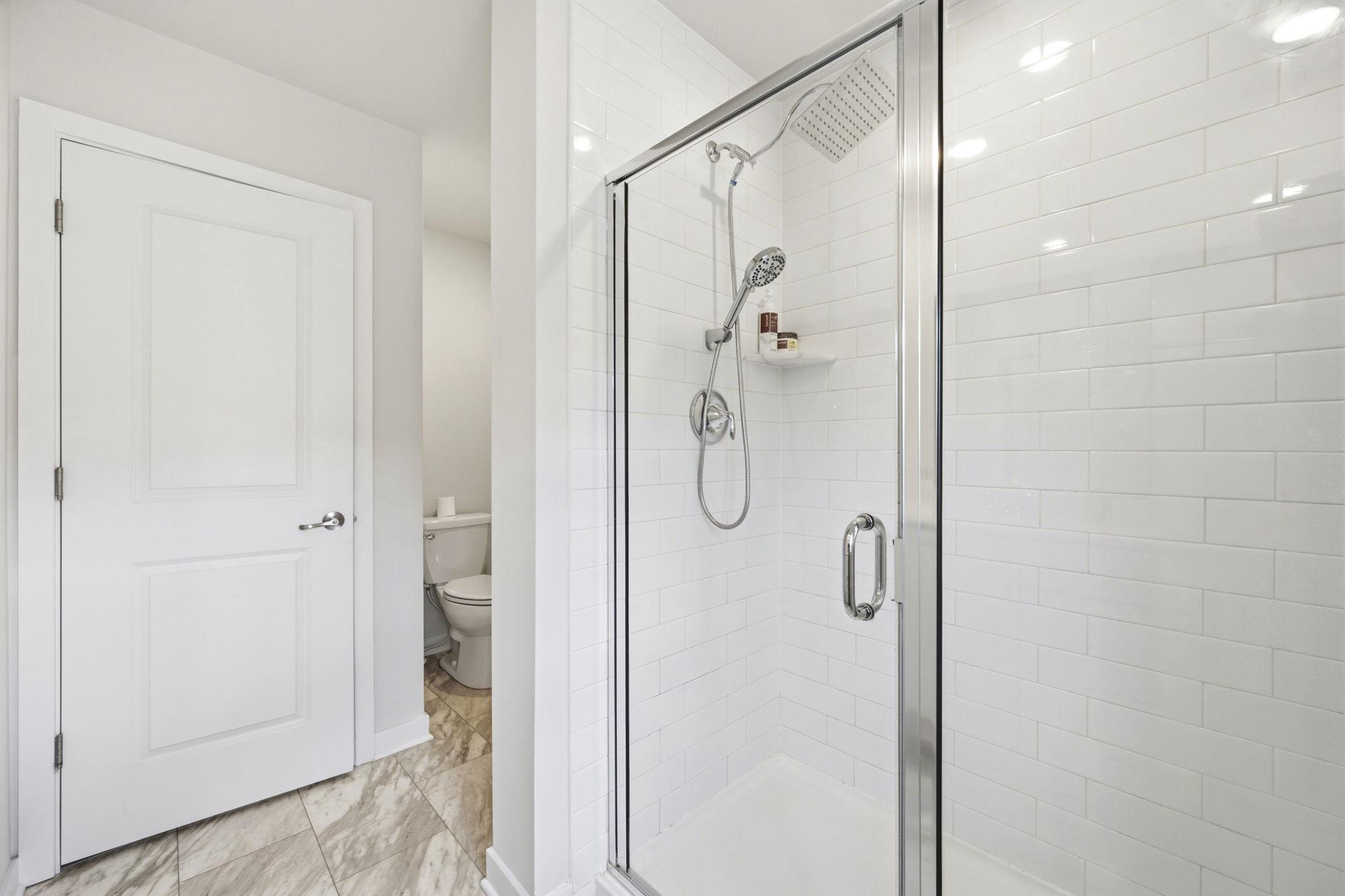 727 Hunsberger Road Spring City, PA 19475 - Photo 33 of 56 Sleek modern shower in bright space upper level.