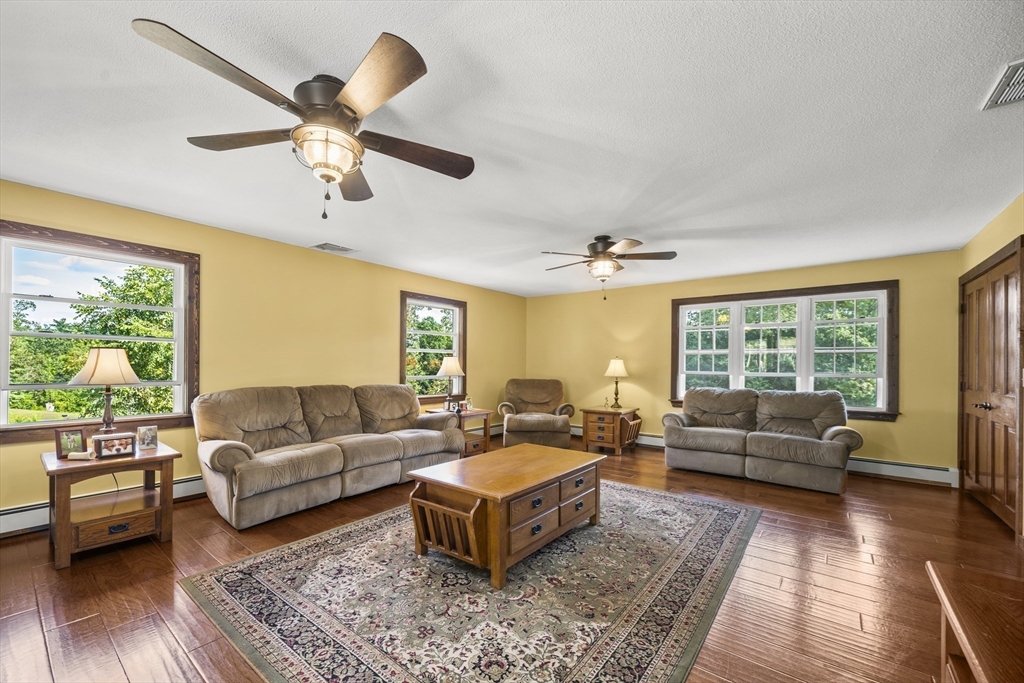 235 James Street Ludlow, MA 01056 - Photo 12 of 41 a living room with furniture and a large window