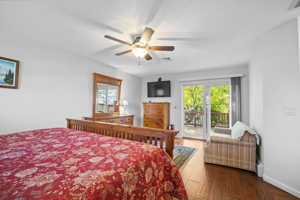 235 James Street Ludlow, MA 01056 - Photo 19 of 41 a bedroom with a bed and a large window