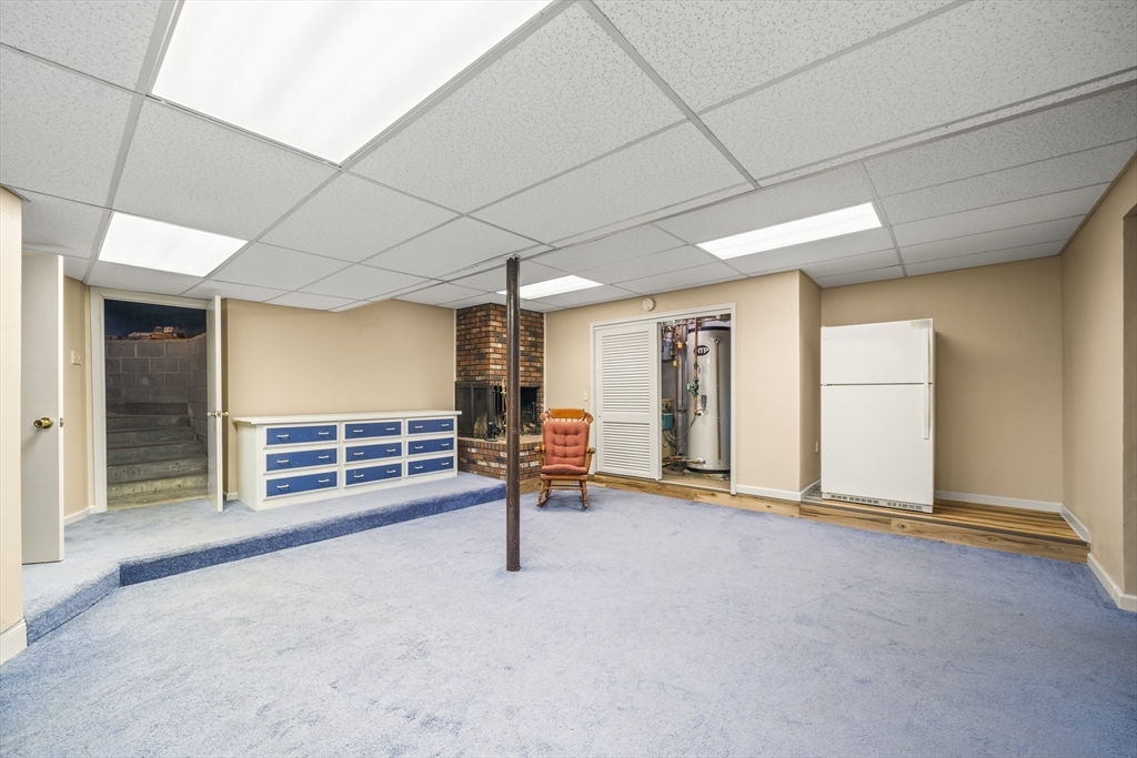 235 James Street Ludlow, MA 01056 - Photo 26 of 41 an empty room with wooden floor and windows