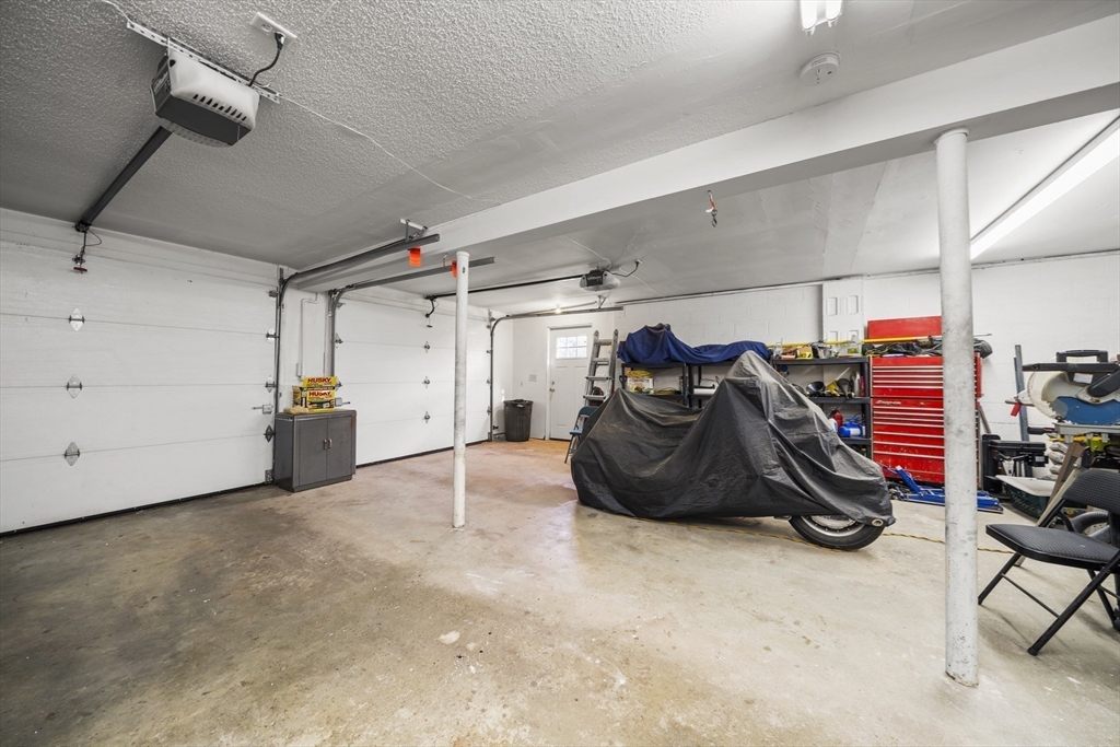 235 James Street Ludlow, MA 01056 - Photo 28 of 41 a view of a garage with furniture and other items