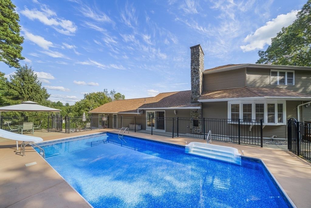 235 James Street Ludlow, MA 01056 - Photo 32 of 41 a front view of house with yard and trees