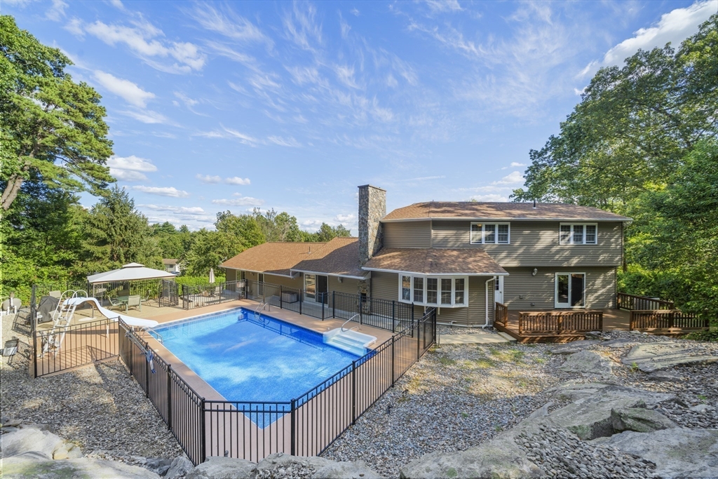235 James Street Ludlow, MA 01056 - Photo 33 of 41 a view of a house with a patio