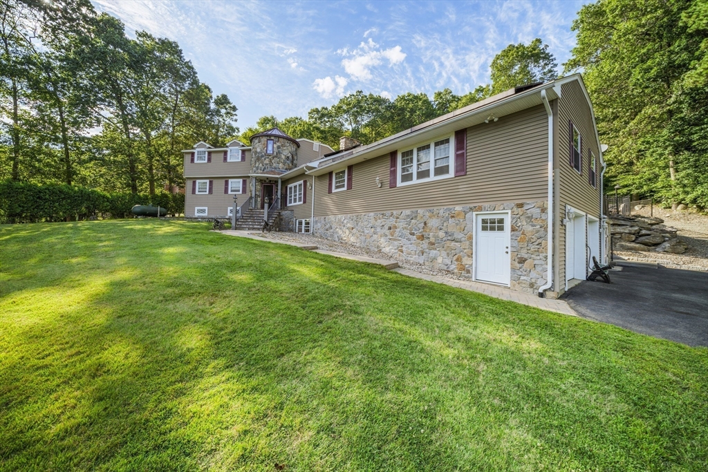 235 James Street Ludlow, MA 01056 - Photo 6 of 41 a view of a house with a yard