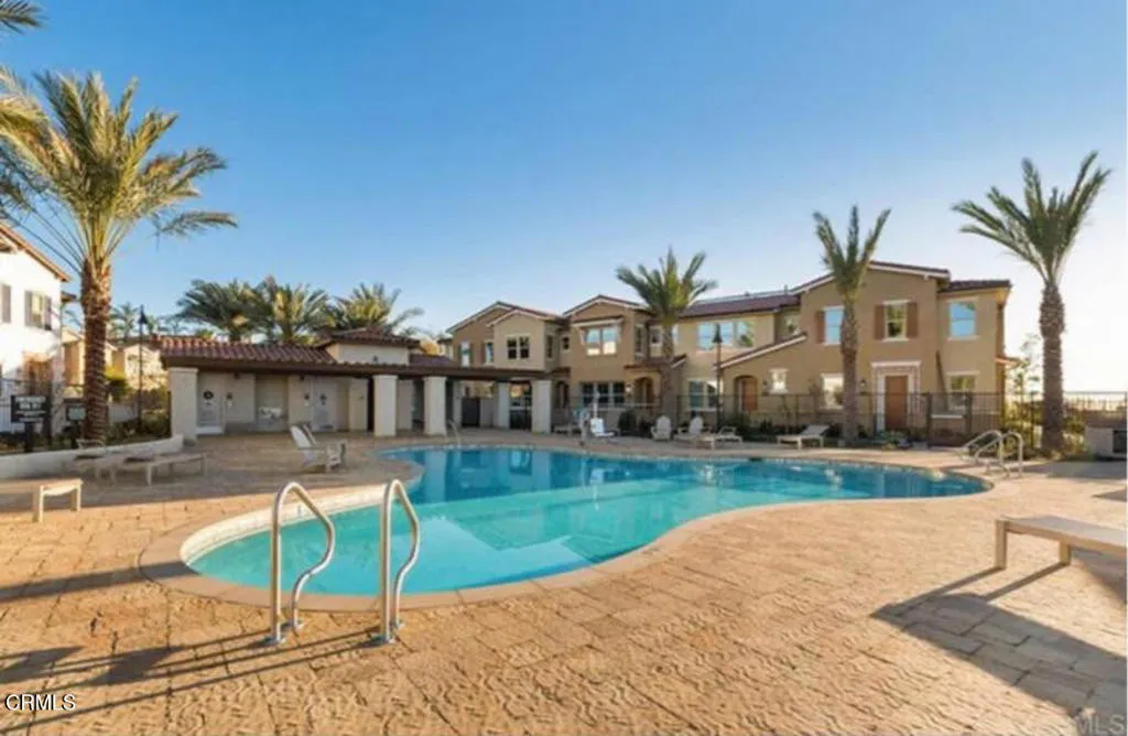 1107 Delpy View Point Vista, CA 92084 - Photo 7 of 8 a view of a house with swimming pool and a yard