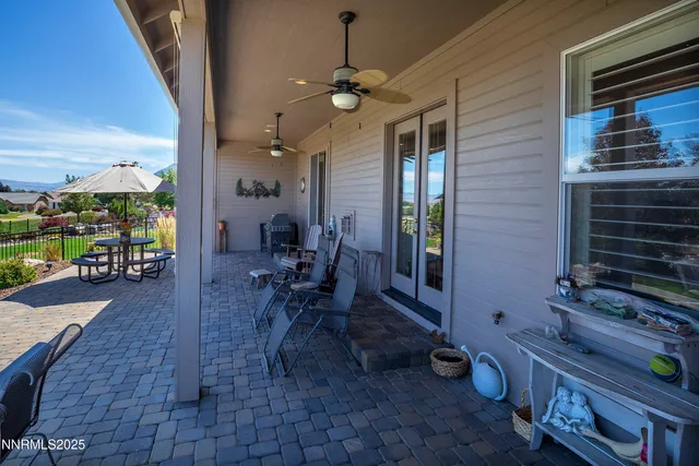 a view of a swimming pool with a patio