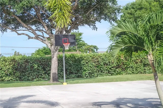 a picture of a yard and a fountain