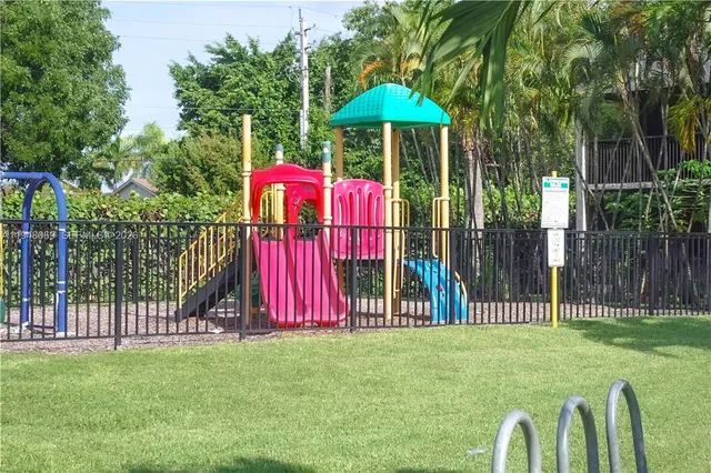 a view of a yard with a slide