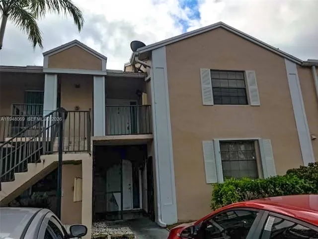 a front view of a house with yard