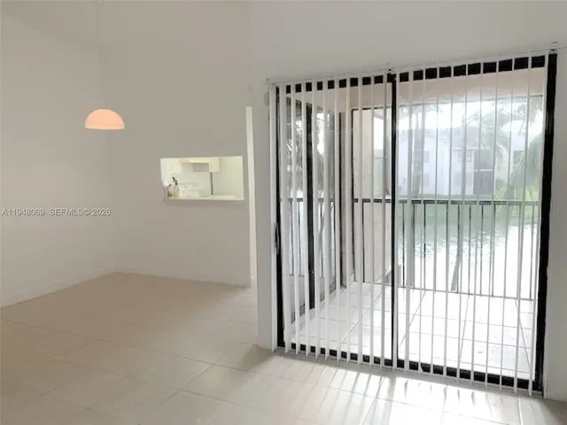 a view of a bathroom with a glass door