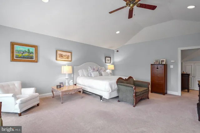 a bedroom with furniture and a couch