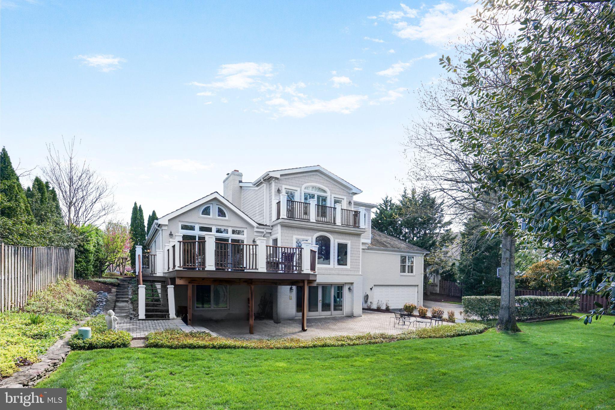 1236 Meyer Court McLean, VA 22101 - Photo 2 of 3 a front view of a house with garden