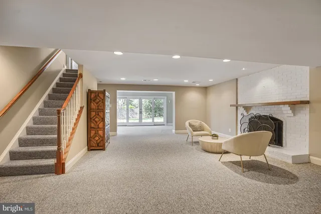 a view of livingroom with furniture and staircase