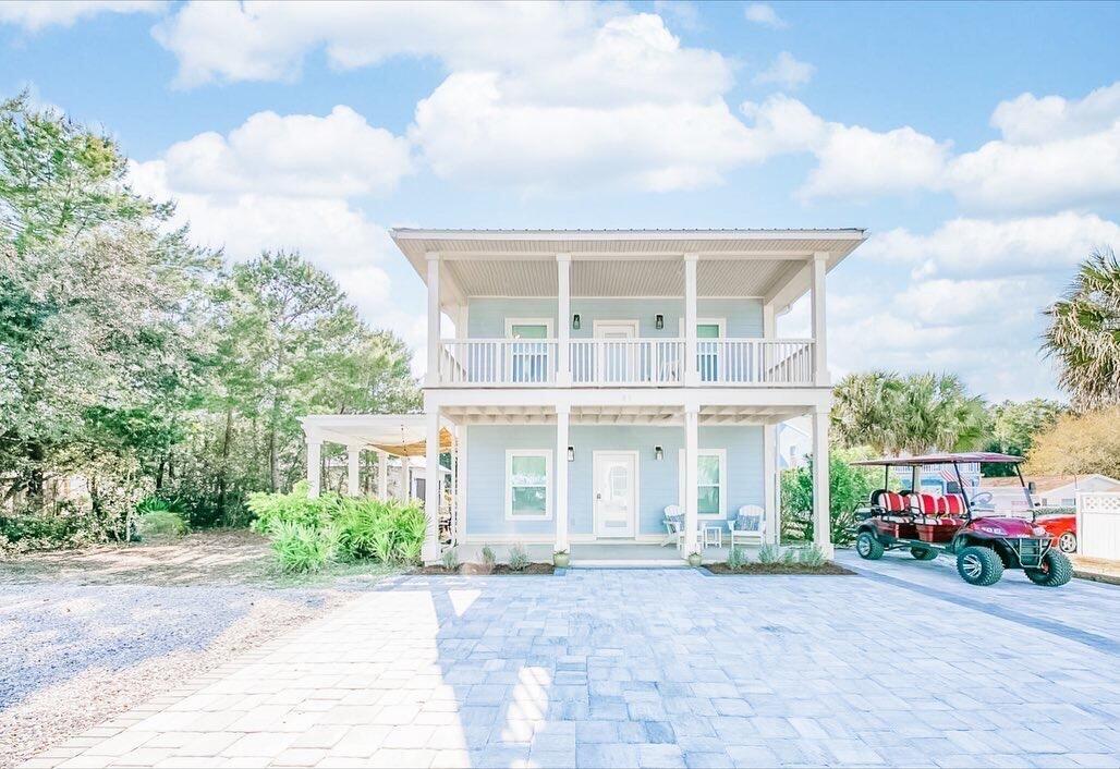 83 Brown Street Santa Rosa Beach, FL 32459 - Photo 1 of 42 front view of house with a street