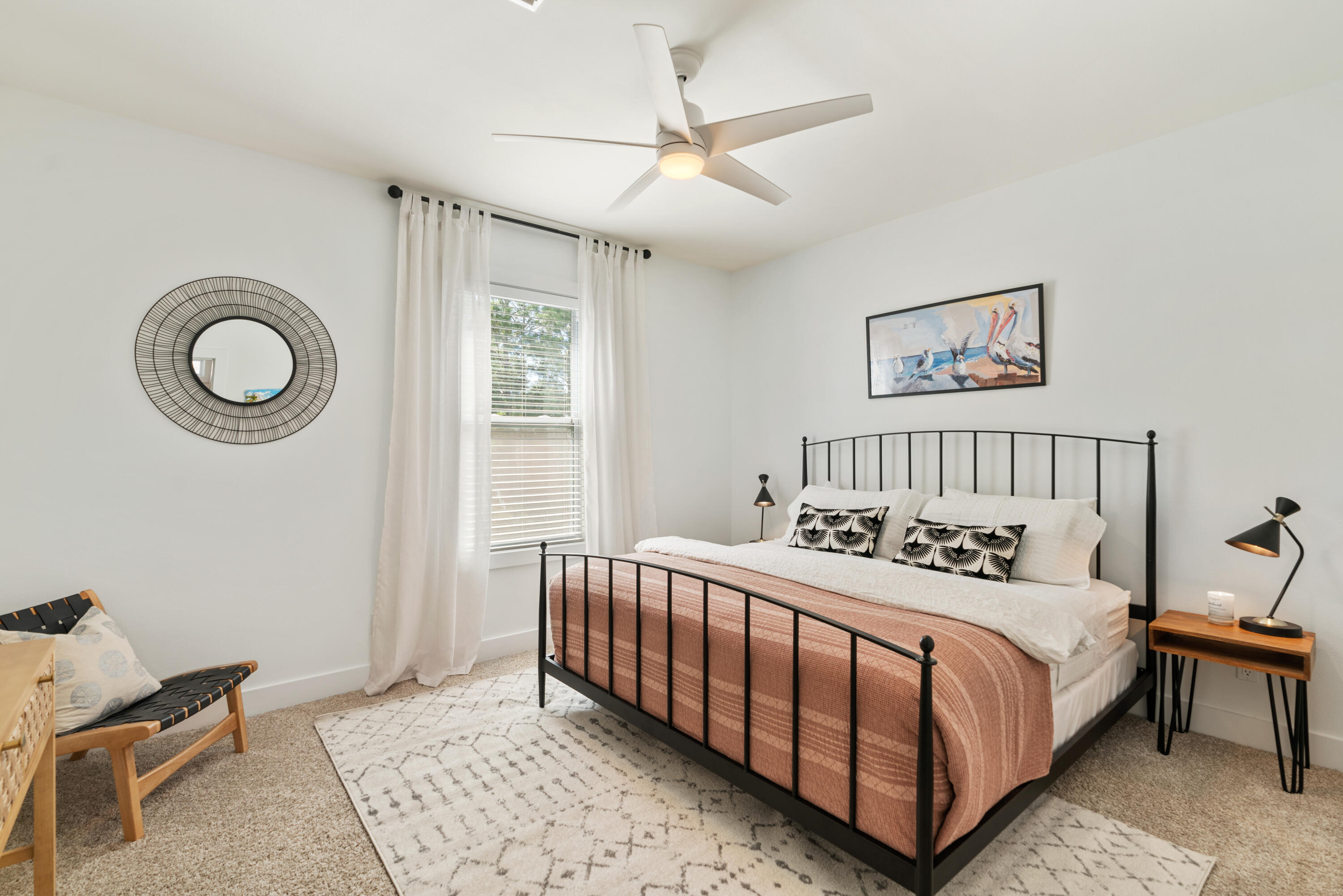 83 Brown Street Santa Rosa Beach, FL 32459 - Photo 13 of 42 a bedroom with a bed and a window