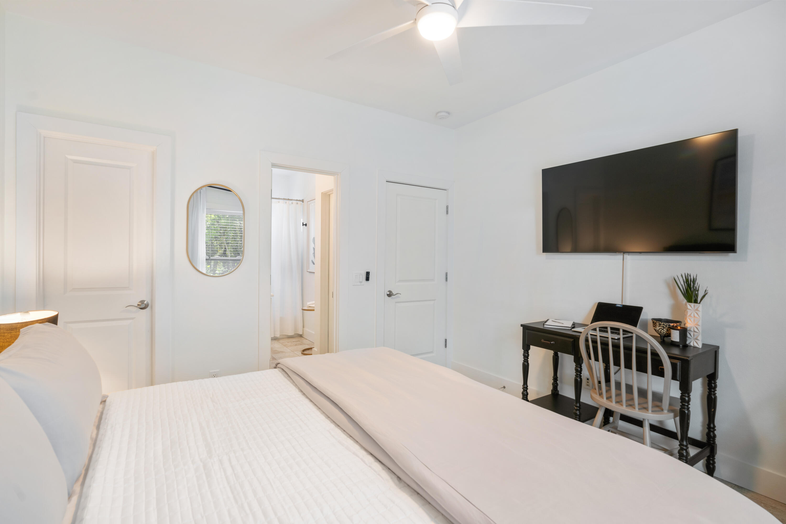 83 Brown Street Santa Rosa Beach, FL 32459 - Photo 17 of 42 a bedroom with a bed and a flat screen tv