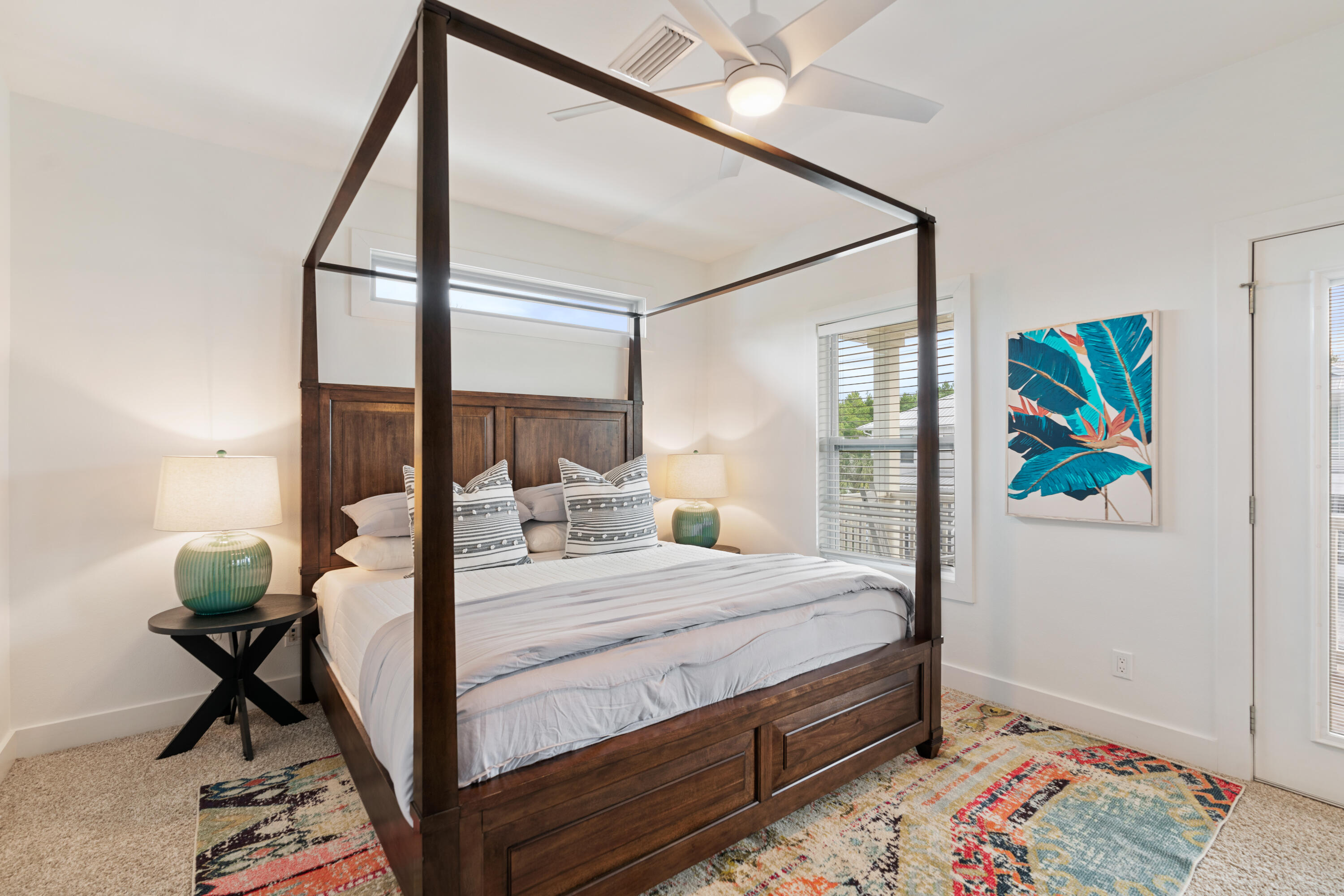 83 Brown Street Santa Rosa Beach, FL 32459 - Photo 23 of 42 a bedroom with a bed table and chair