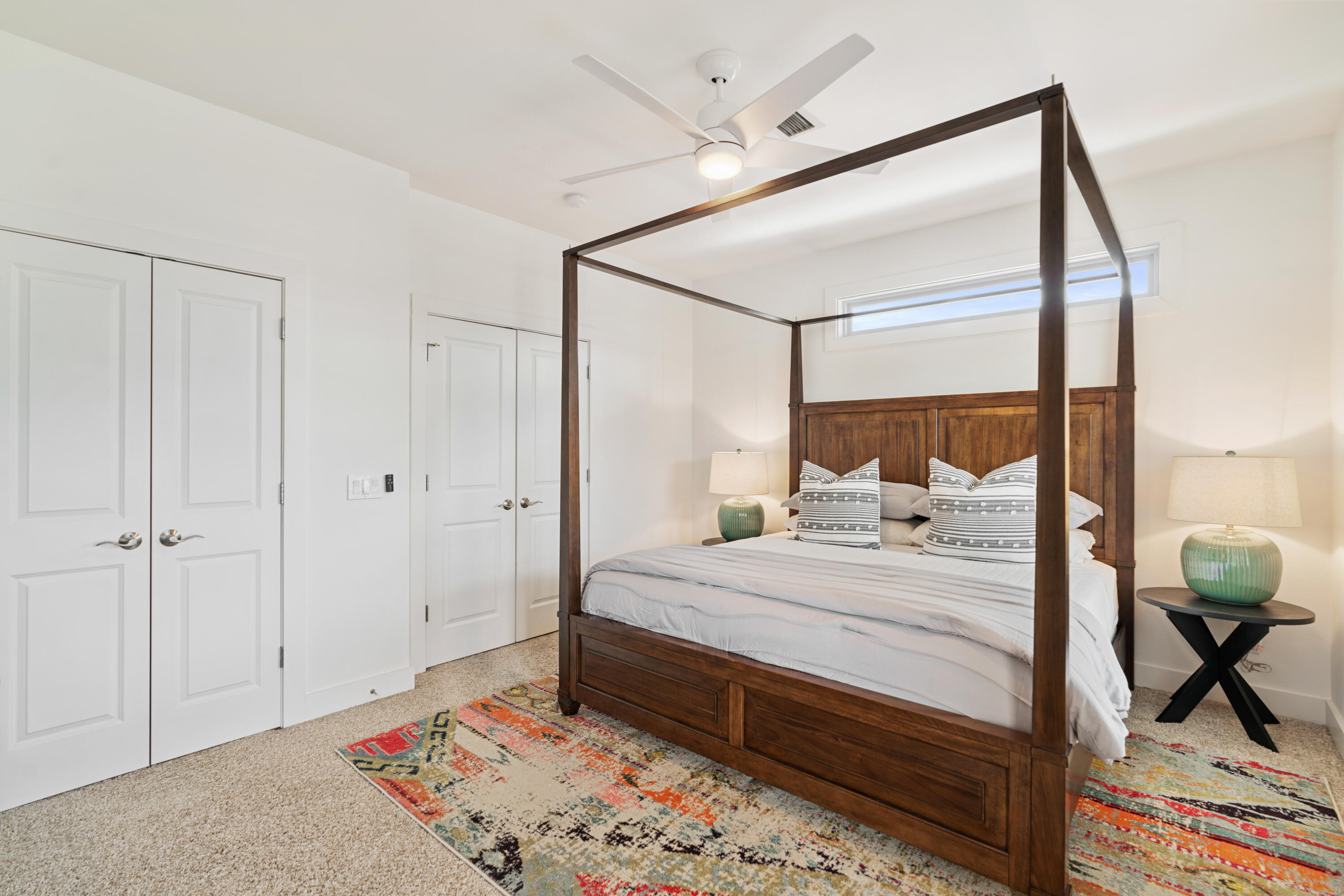 83 Brown Street Santa Rosa Beach, FL 32459 - Photo 28 of 42 a bedroom with a bed and a mirror