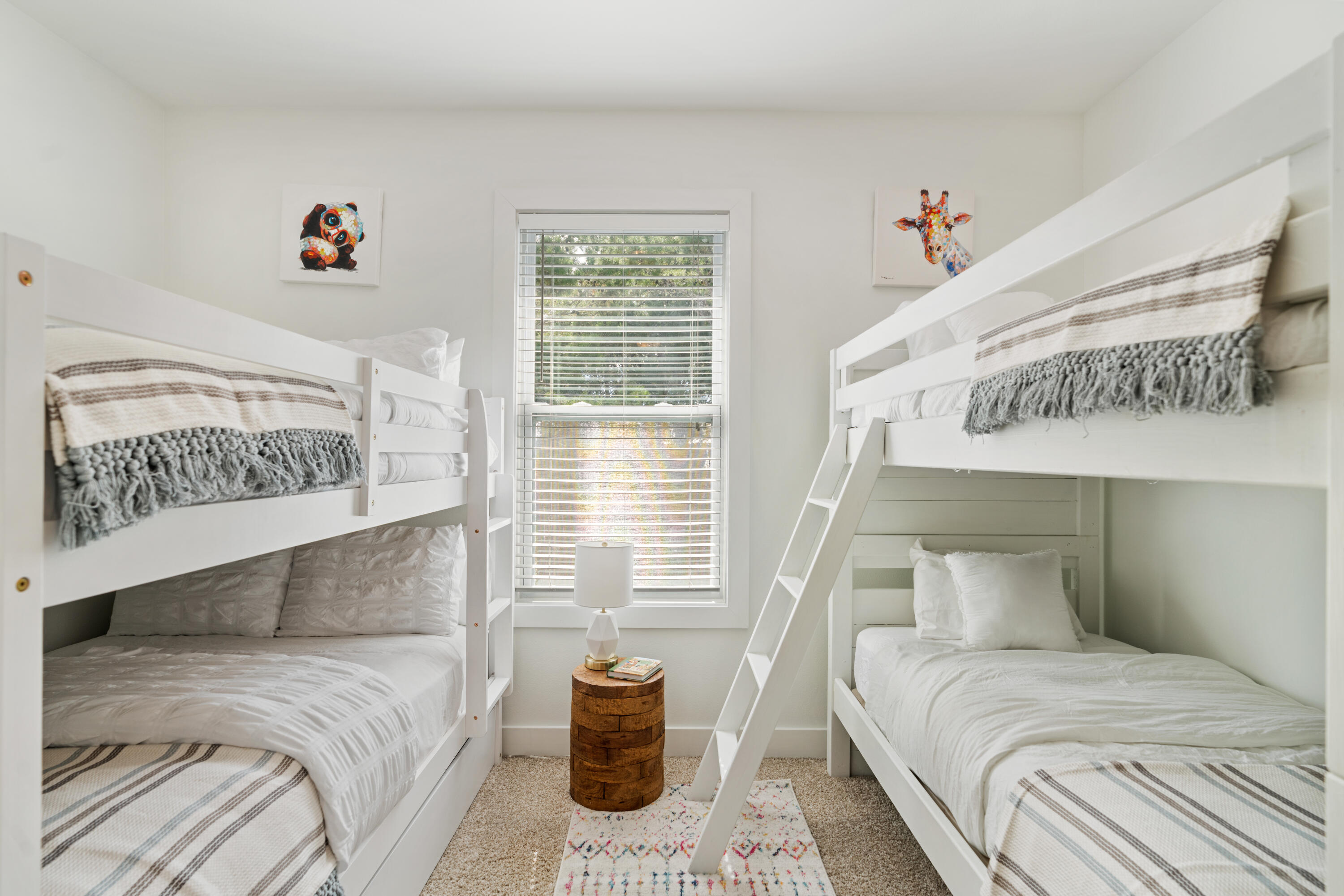 83 Brown Street Santa Rosa Beach, FL 32459 - Photo 30 of 42 a bedroom with a bed and a window