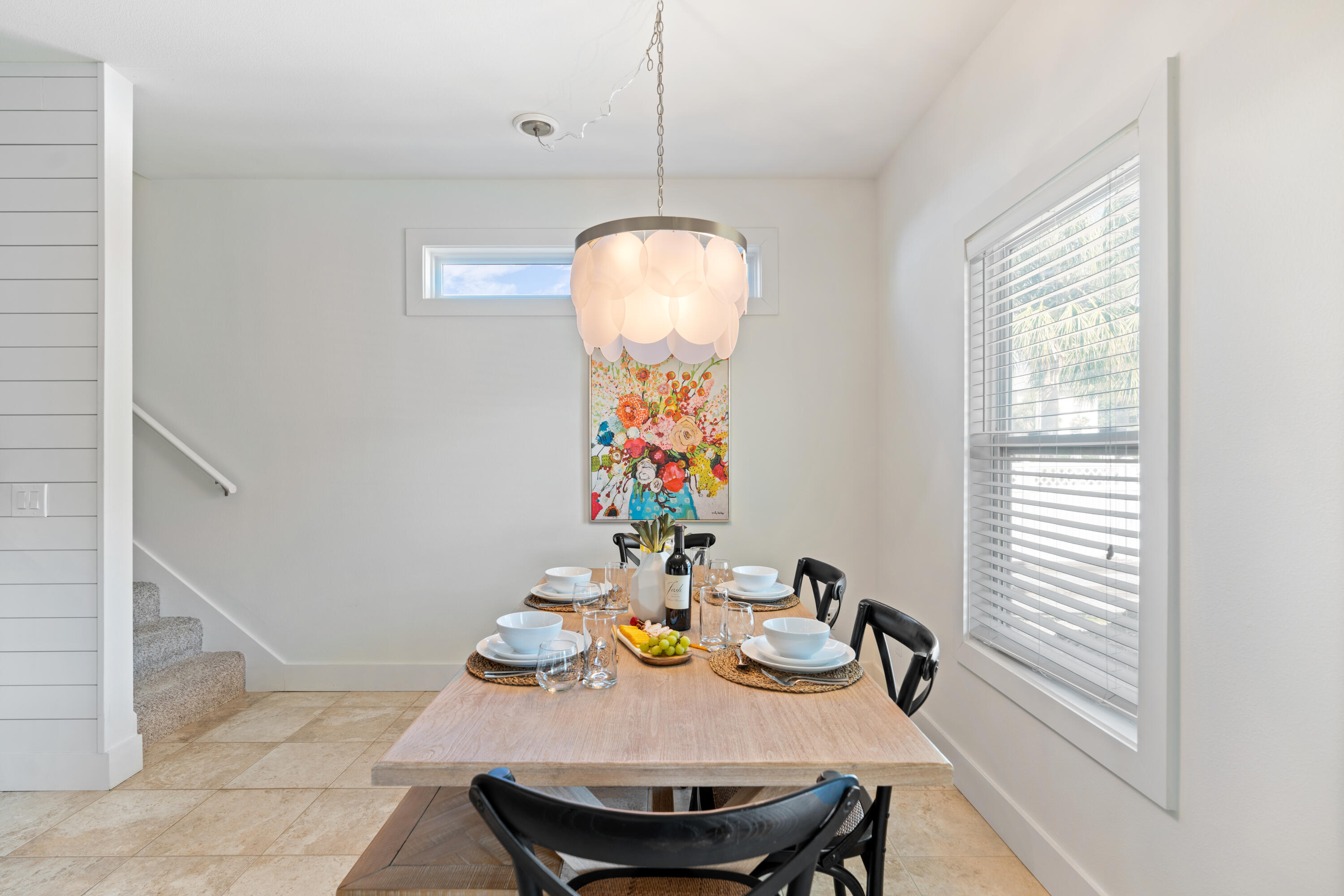 83 Brown Street Santa Rosa Beach, FL 32459 - Photo 8 of 42 a view of a dining room with furniture and a window