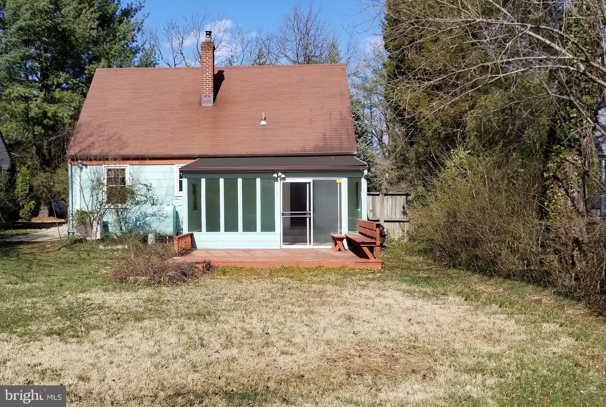 704 Westover Road Baltimore, MD 21208 - Photo 2 of 2 a view of a house with a yard porch and sitting area