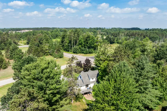 $384,900 | 9075 Windsong Lane, Cadillac, MI 49601