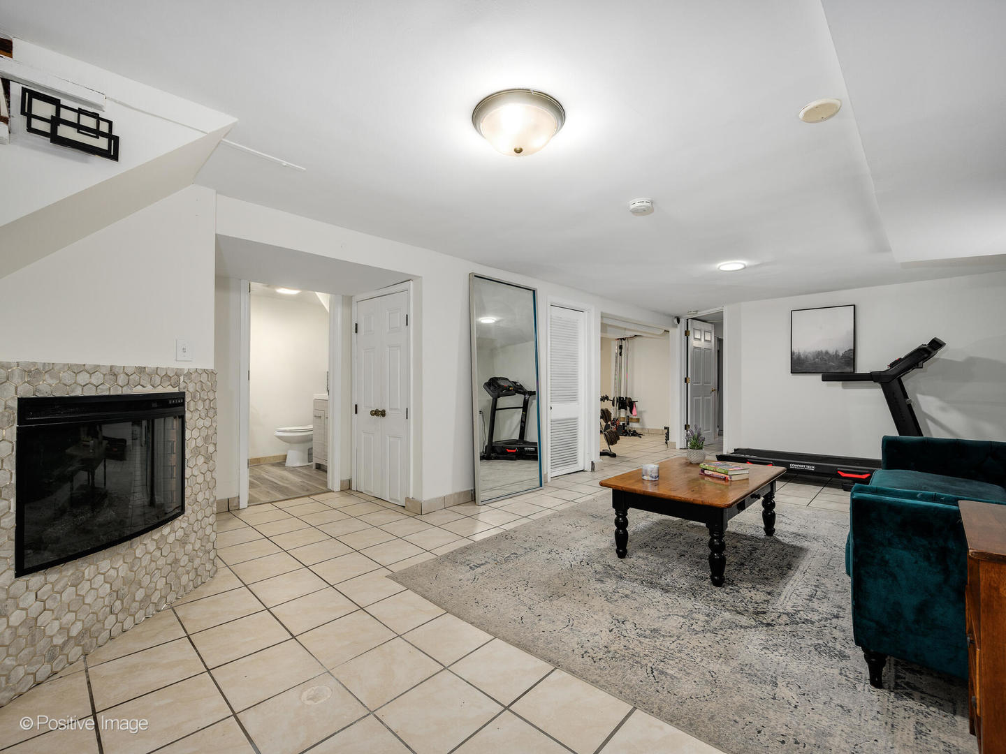 3742 Clinton Avenue Berwyn, IL 60402 - Photo 19 of 28 a view of a livingroom with furniture and a fireplace