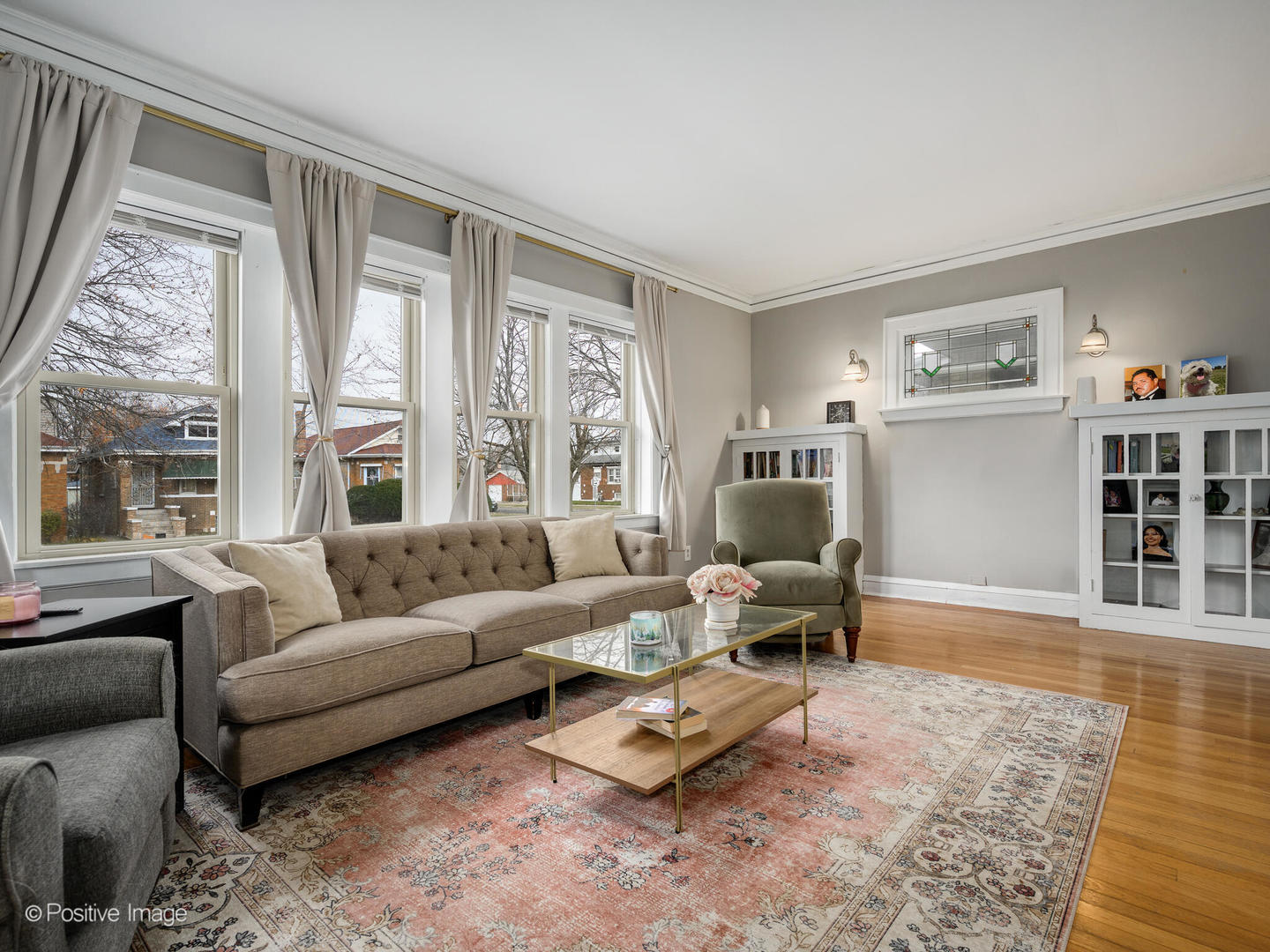 3742 Clinton Avenue Berwyn, IL 60402 - Photo 3 of 28 a living room with furniture and a large window