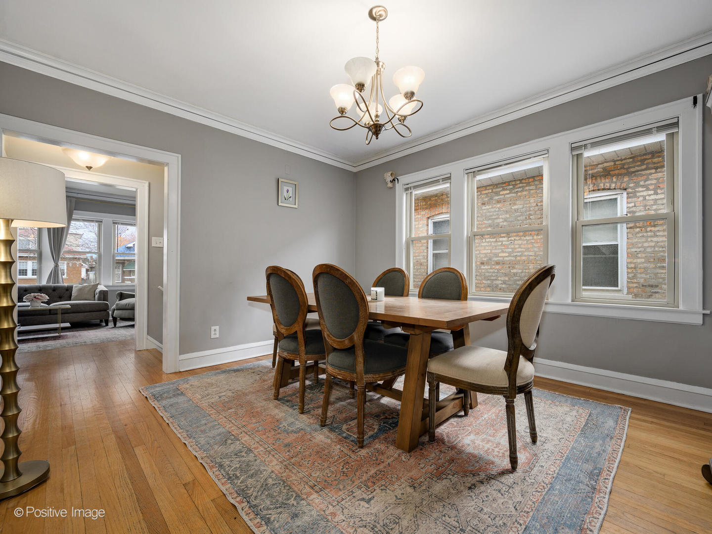 3742 Clinton Avenue Berwyn, IL 60402 - Photo 7 of 28 a view of a dining room with furniture window and wooden floor
