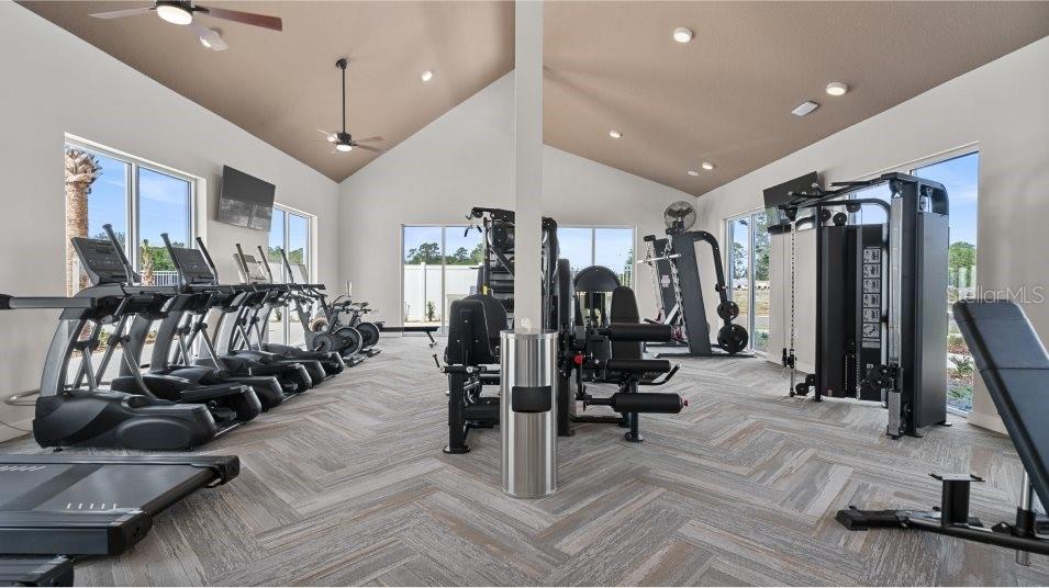 5616 Quiet Palm Loop St. Cloud, FL 34771 - Photo 4 of 25 a view of a room with gym equipment