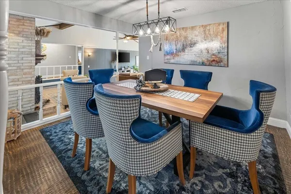 a view of a dining room with furniture